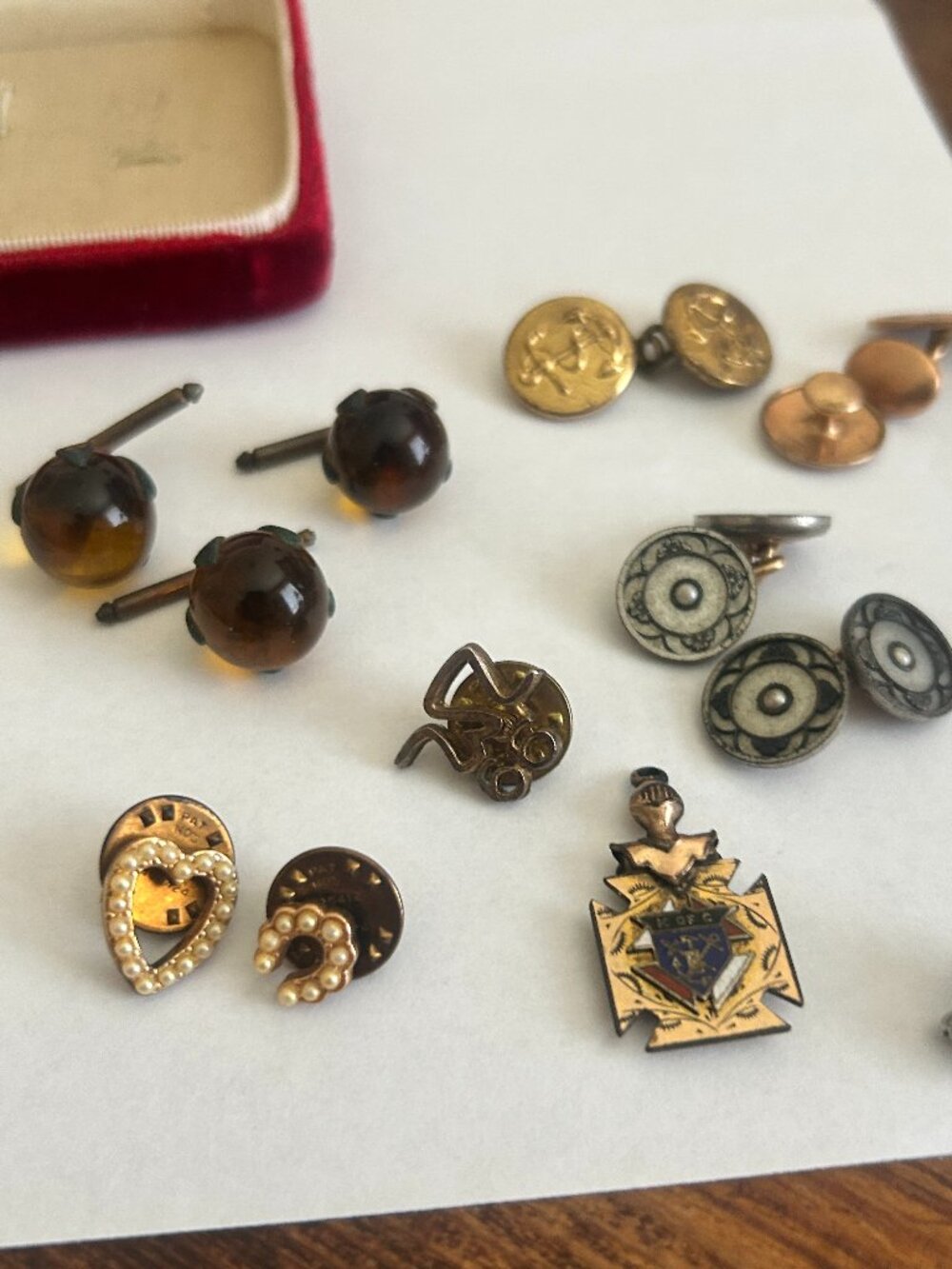 Box of random antique cufflinks and pins